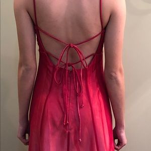 Long pinky red dress for a formal event.